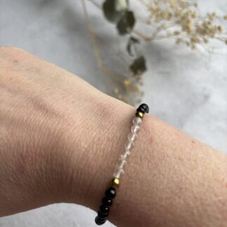 Onyx en bergkristal armband